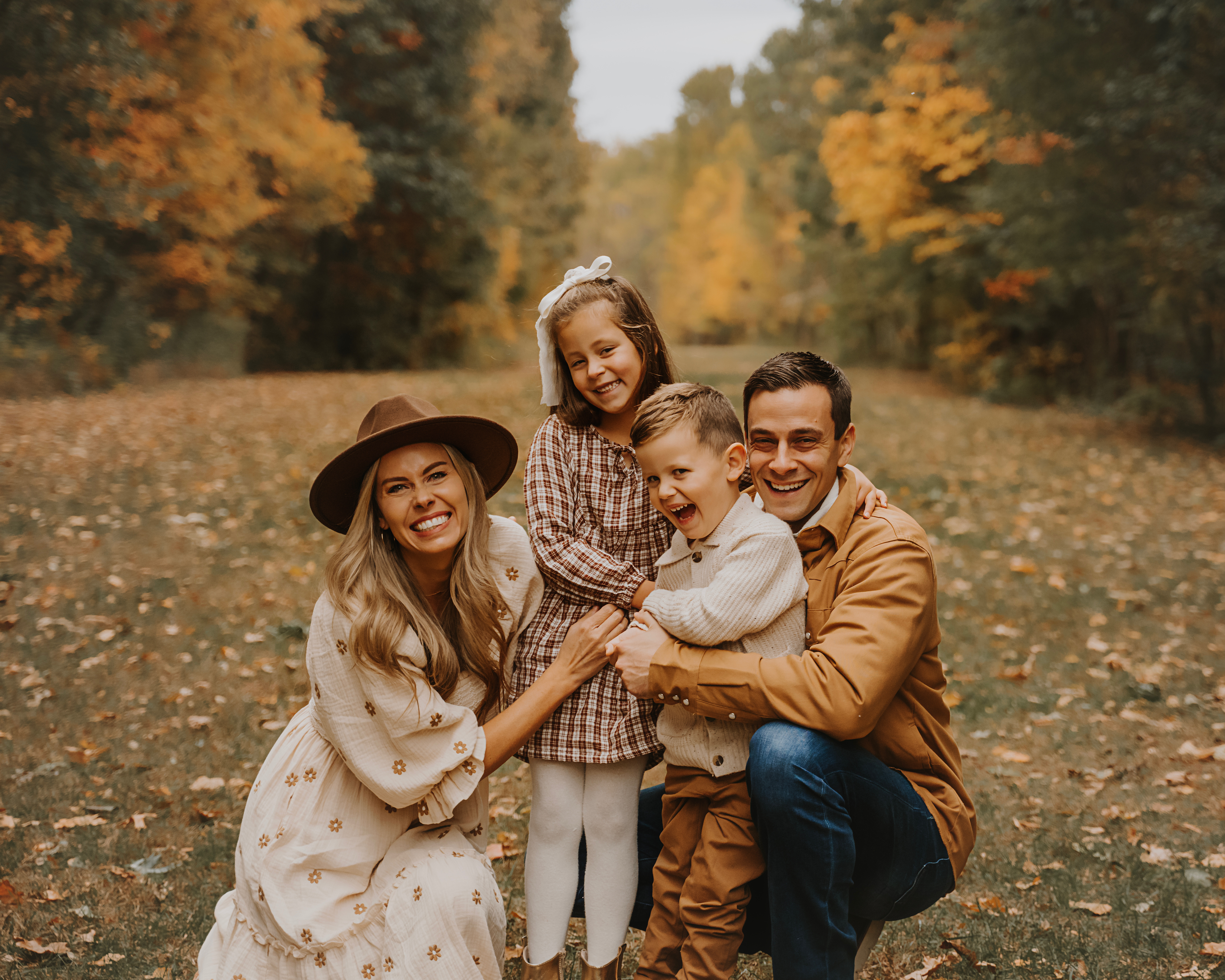 Zach with his wife Allison and kids Evelyn and Lincoln